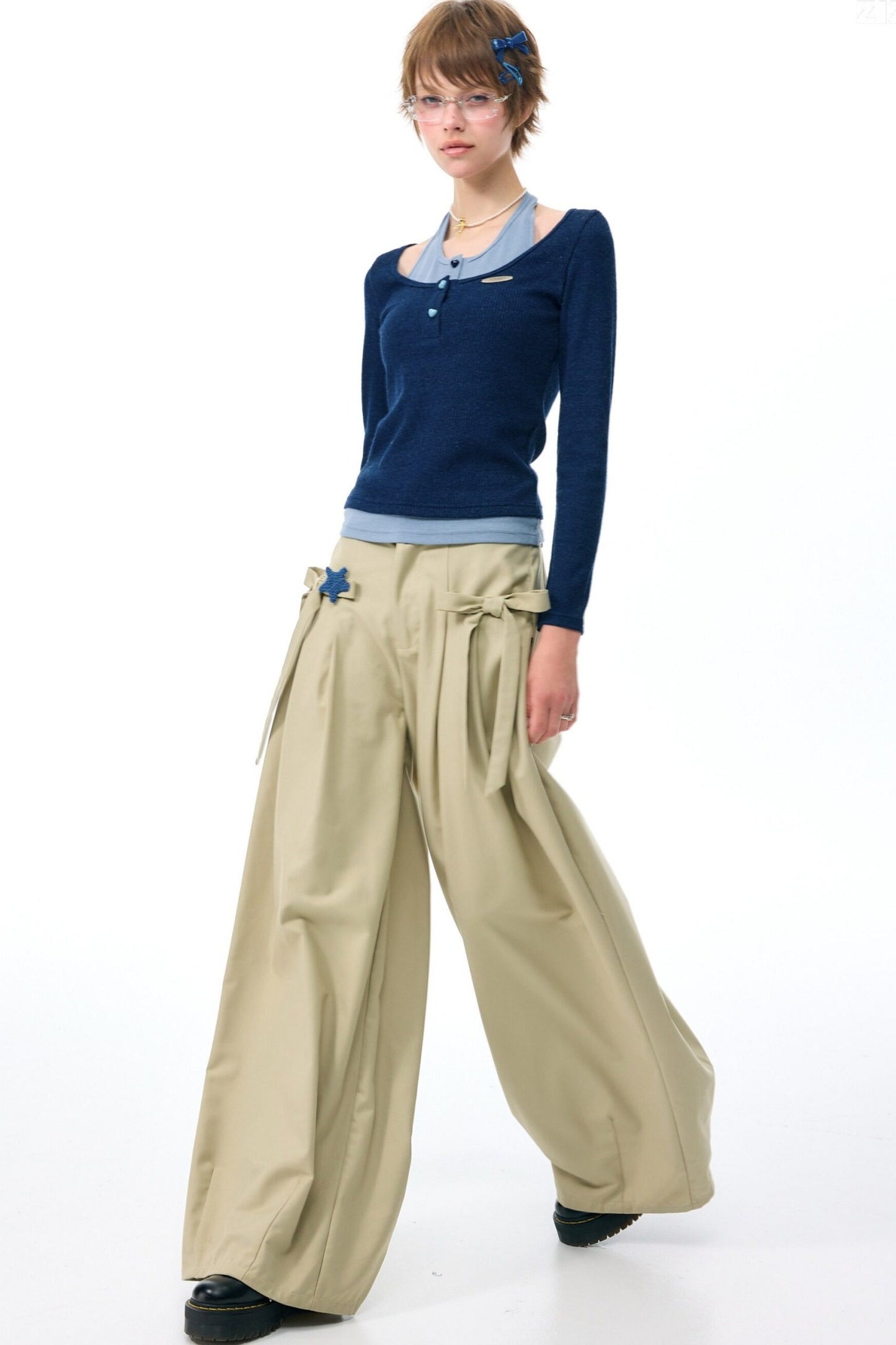 Top in maglia blu a maniche lunghe effetto stratificato