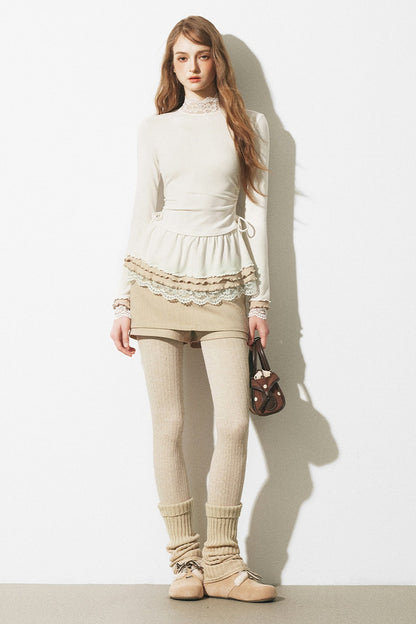 Top a maglia slim fit con bordo in pizzo