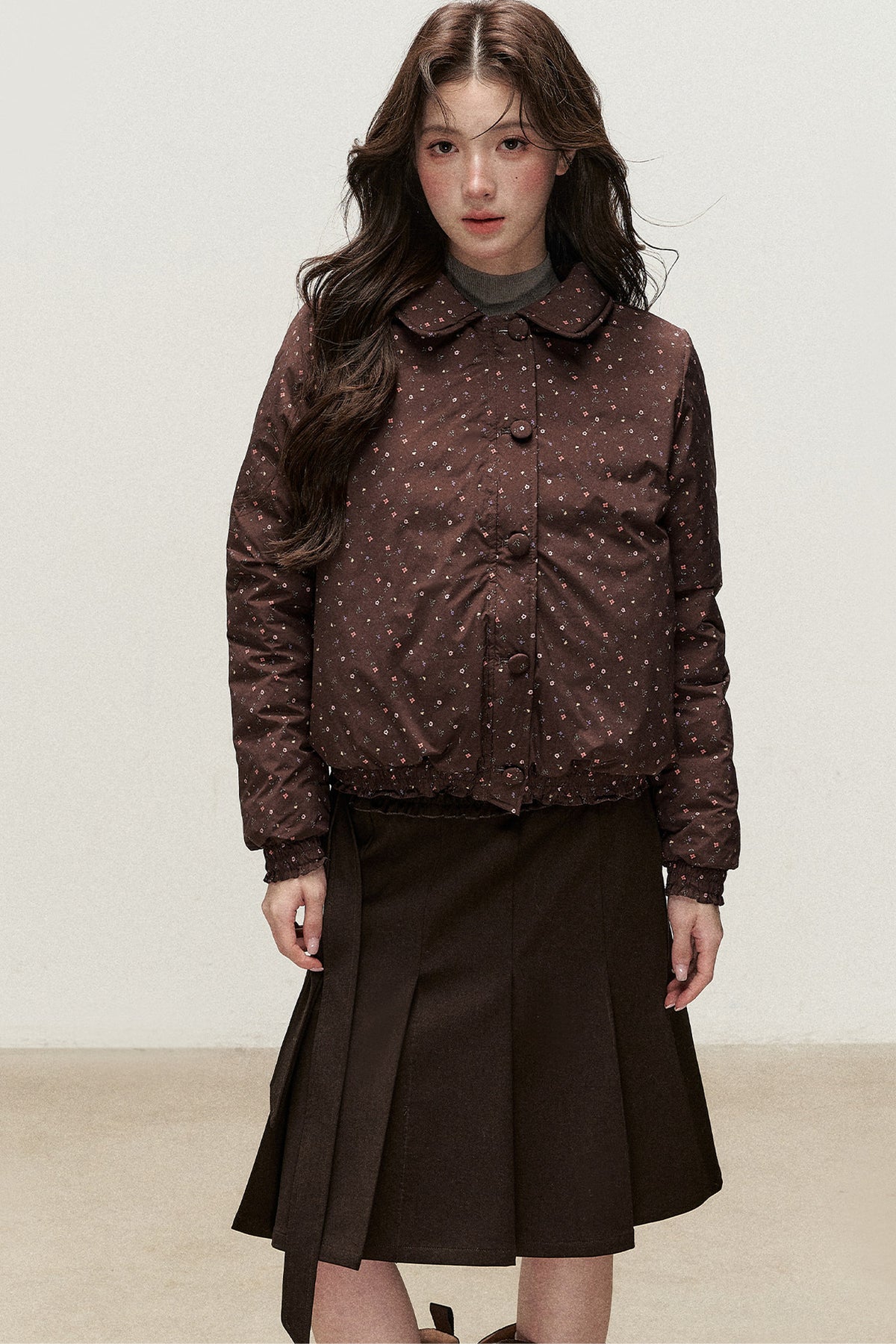 Wendbare Daunenjacke aus Cord mit Bubikragen