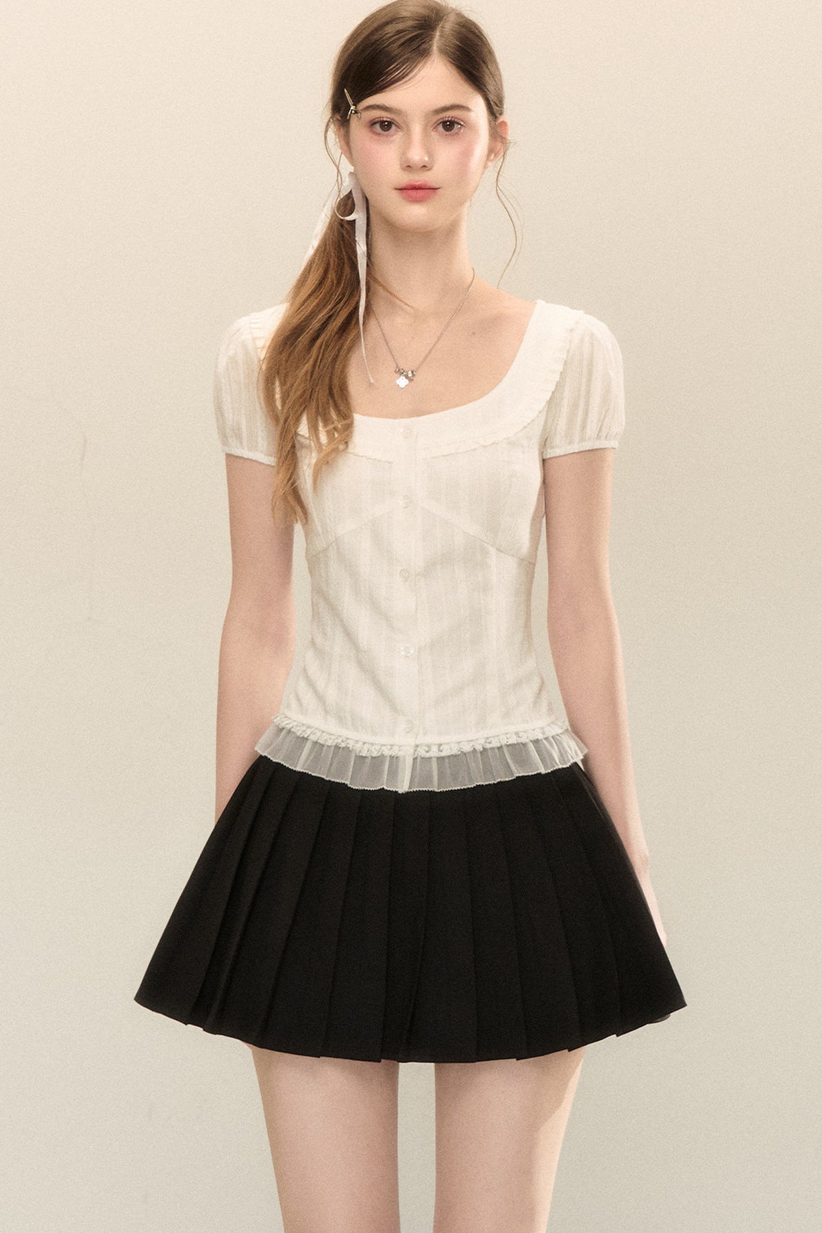 Camicia delicata a maniche corte