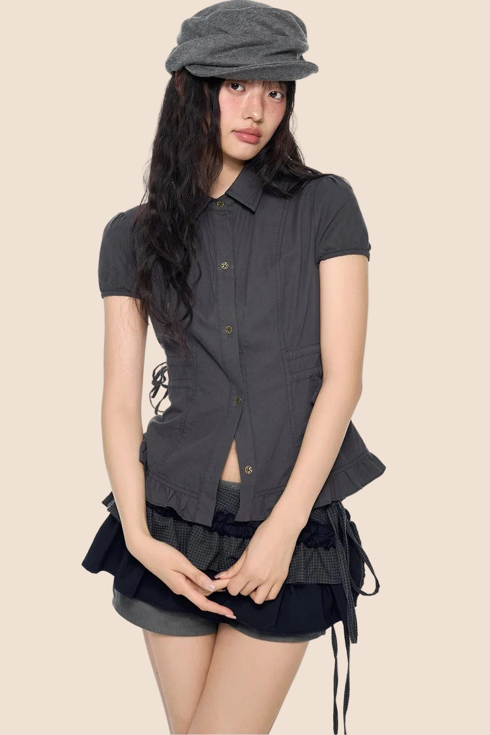 Blouse à manches bouffantes avec lacets
