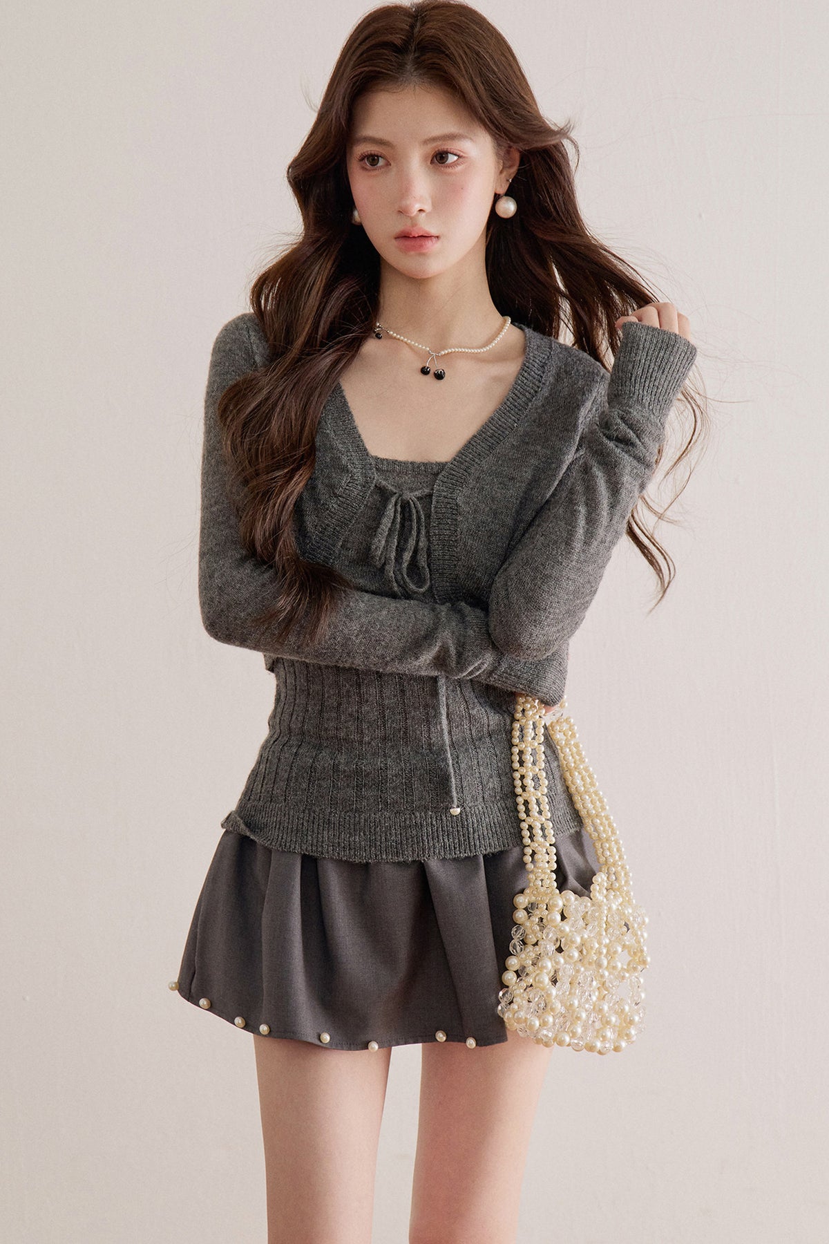 Long-Sleeve V-Neck Lace-Up Knit Sweater