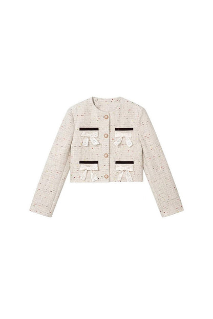 Completo con giacca in tweed di lana e gonna plissettata