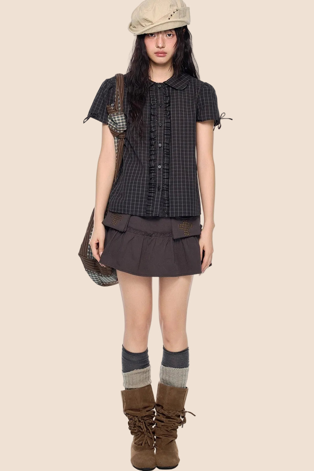 Camicia a righe con fiocco plissettato