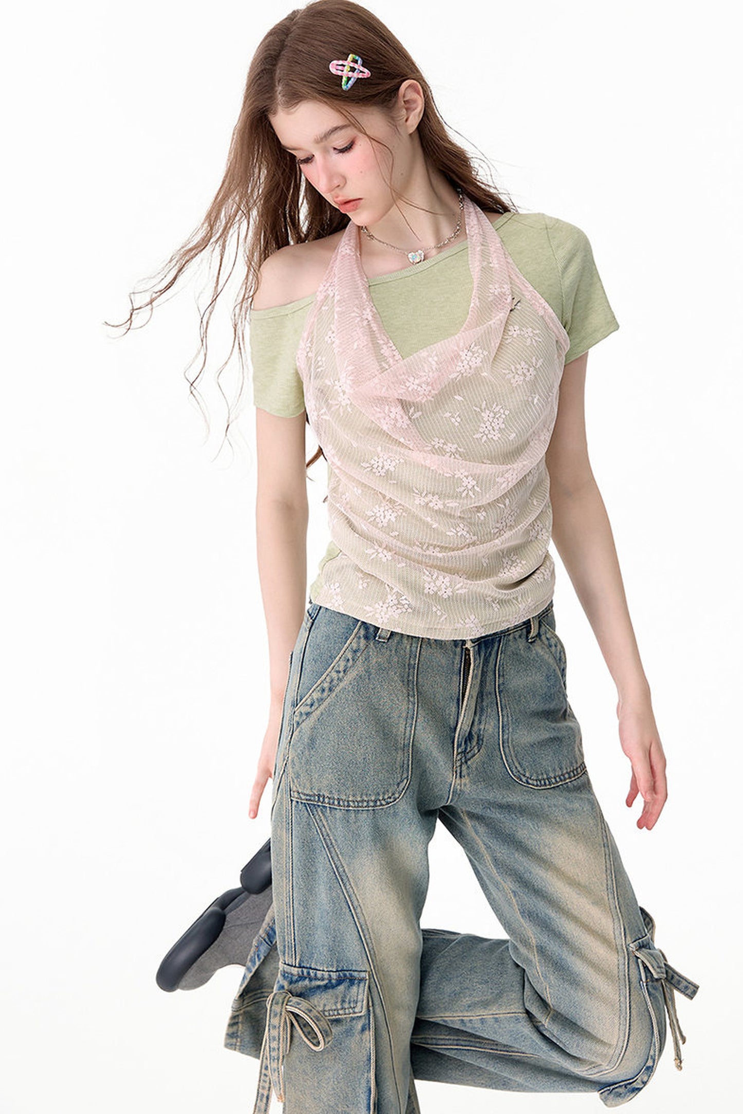 Maglia sovrapposta all'americana in pizzo floreale a maniche corte