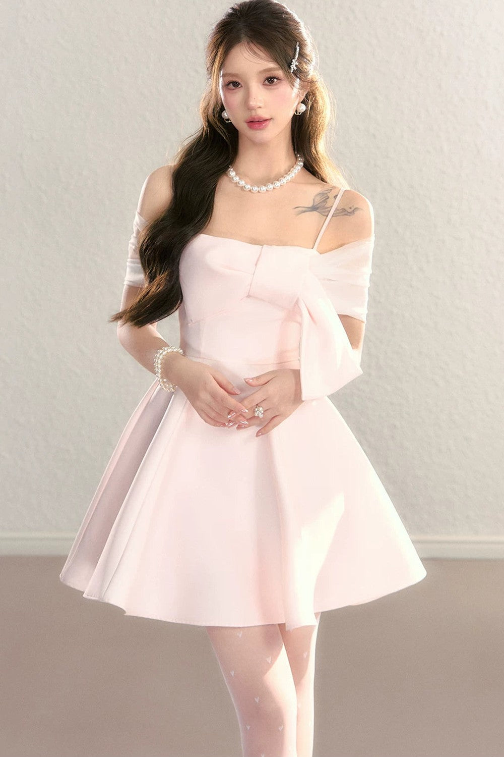 Abito da sera in tulle con spalle scoperte