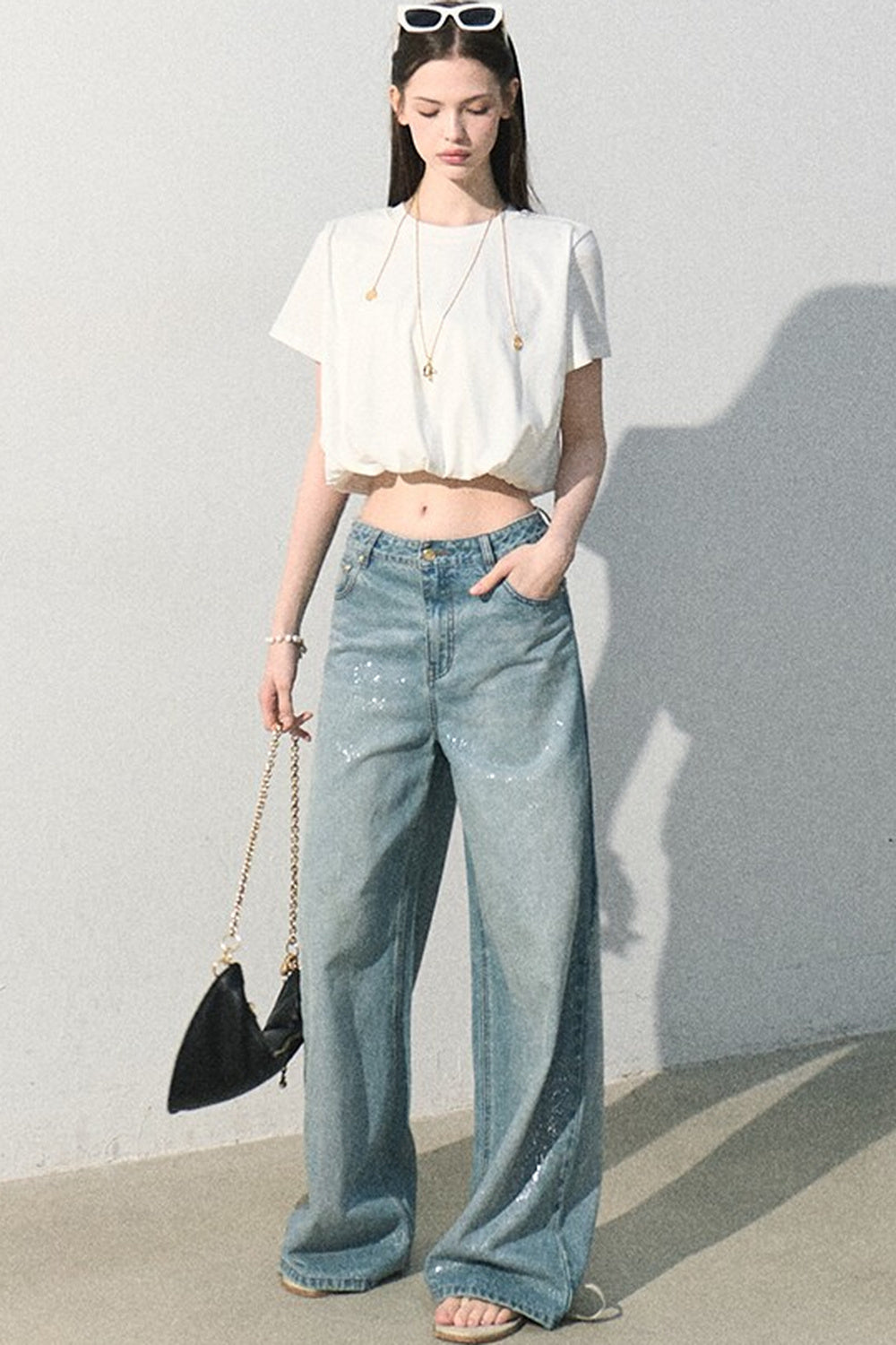 Blusa in lino plissettata a bocciolo