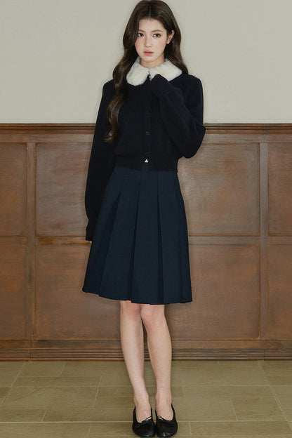 Cardigan en maille à col en fourrure contrastante