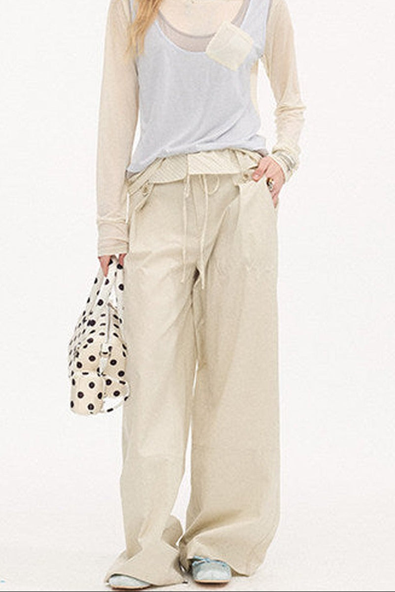 Pantalon droit à rayures et empiècements