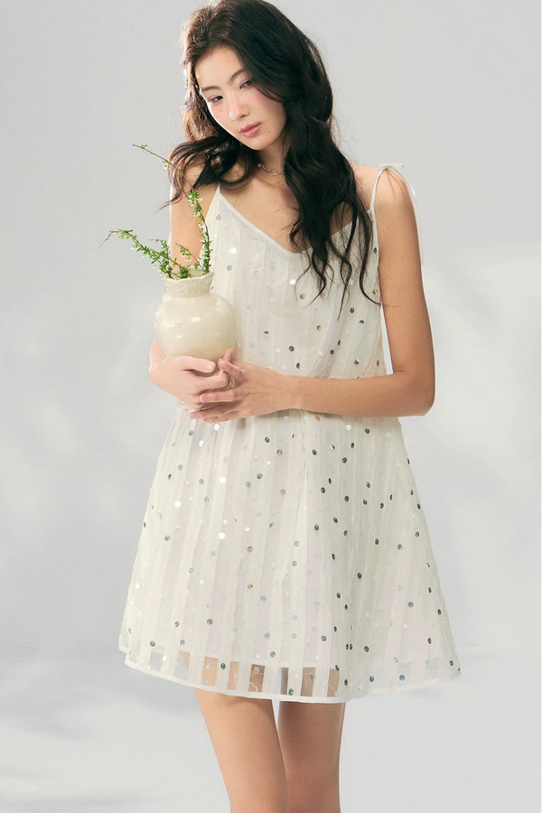 Vestido de malla con lentejuelas brillantes