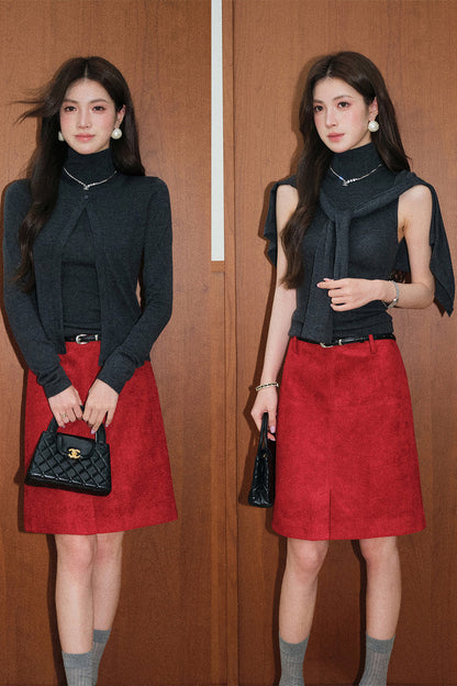 Completo nero in lana con gilet e cardigan