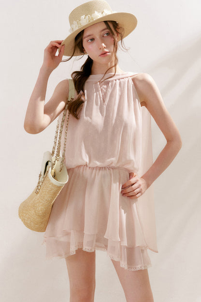 Abito smanicato con scollo all'americana in voile e pizzo