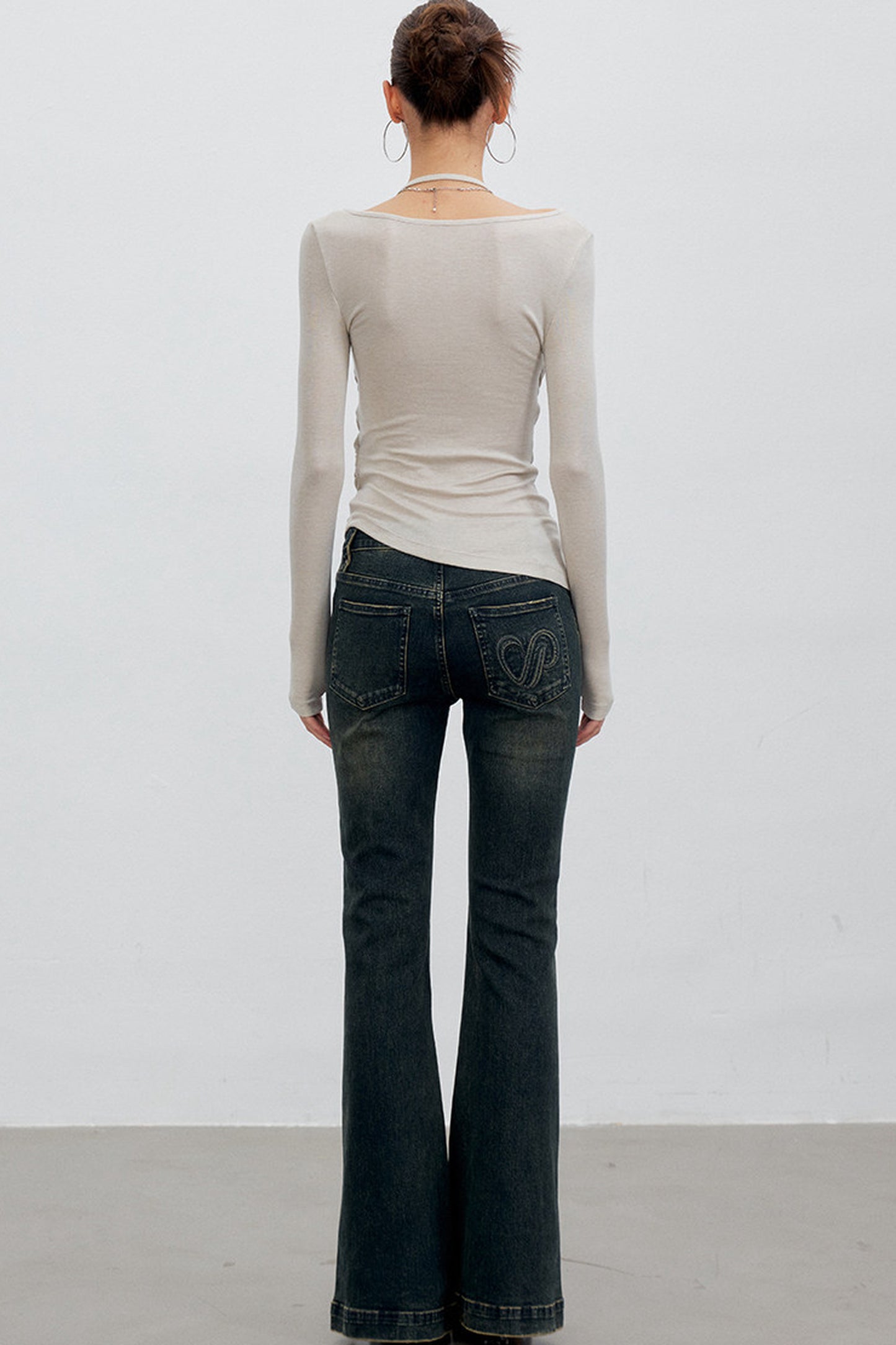 Heart Button Slit Flared Jeans