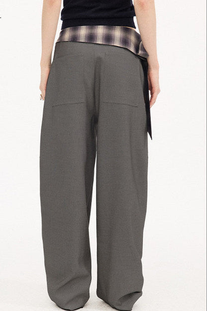 Pantalon à carreaux avec ceinture à nouer