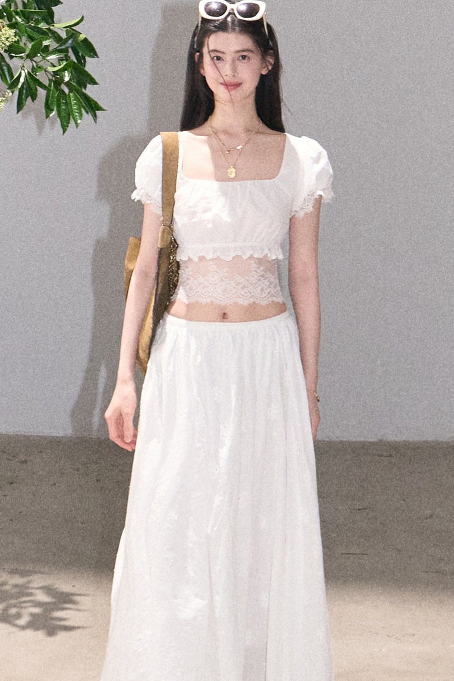 Ensemble haut et jupe en dentelle de coton à motif floral