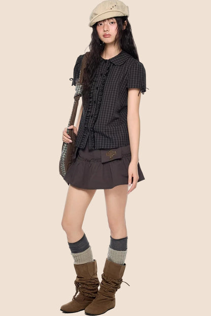Camicia a righe con fiocco plissettato