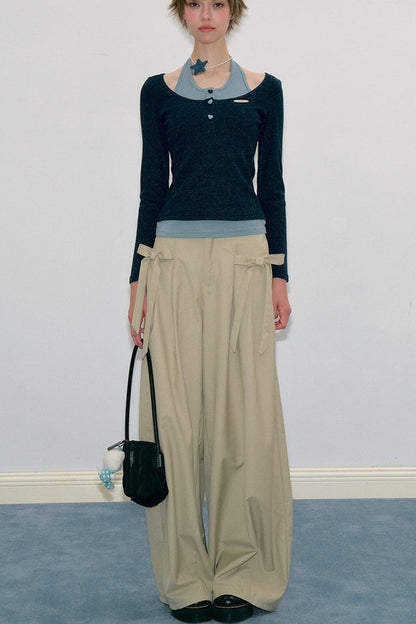 Top in maglia blu a maniche lunghe effetto stratificato