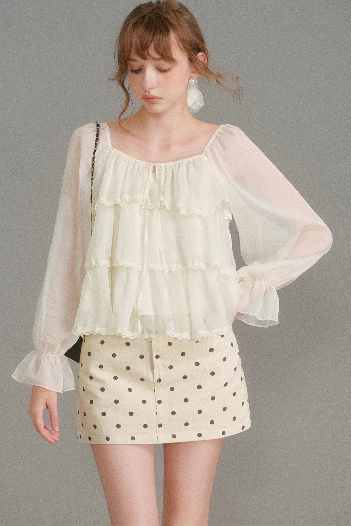 Blouse en mousseline à col carré et volants