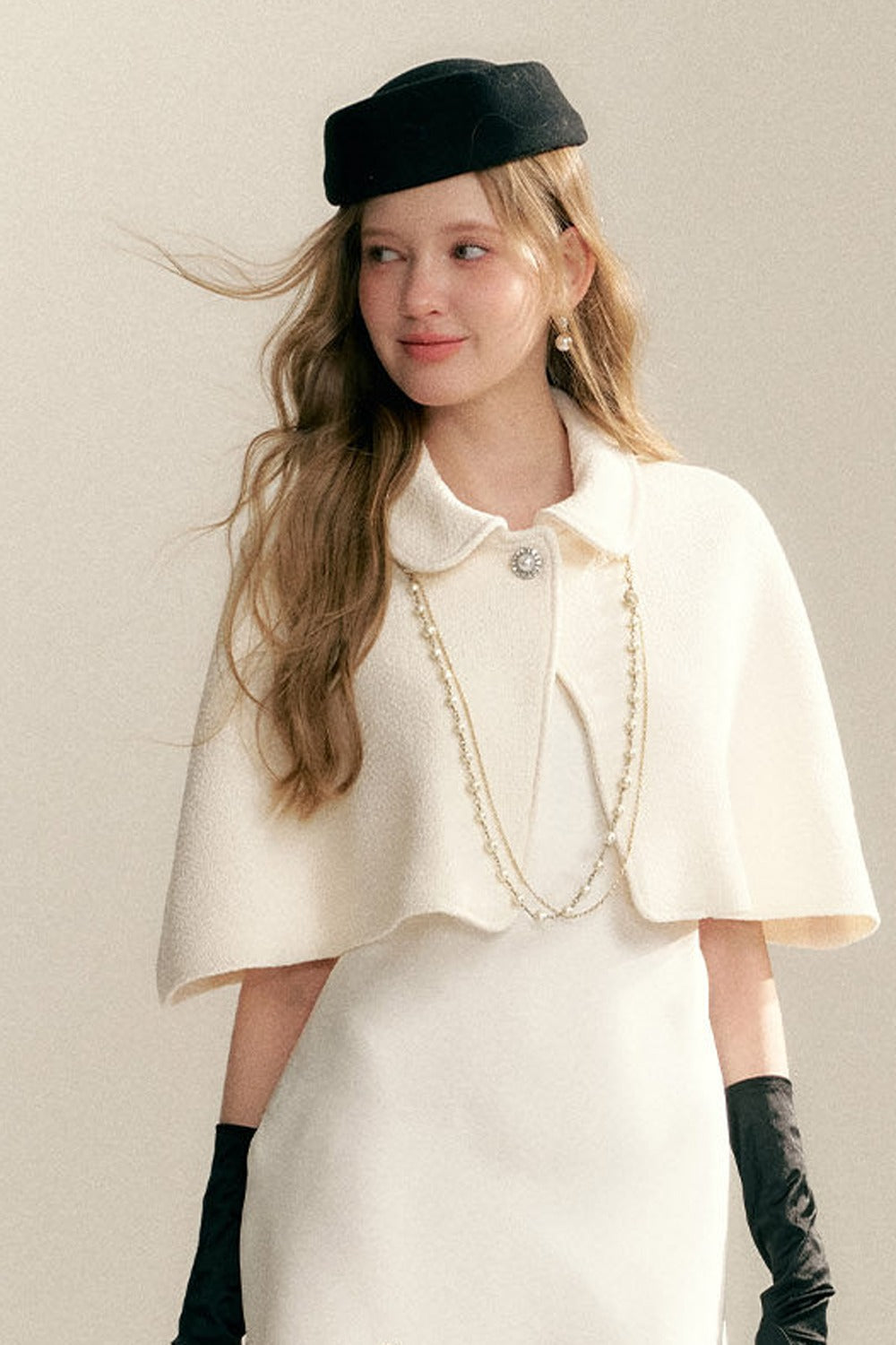 Off-White Sleeveless Cape