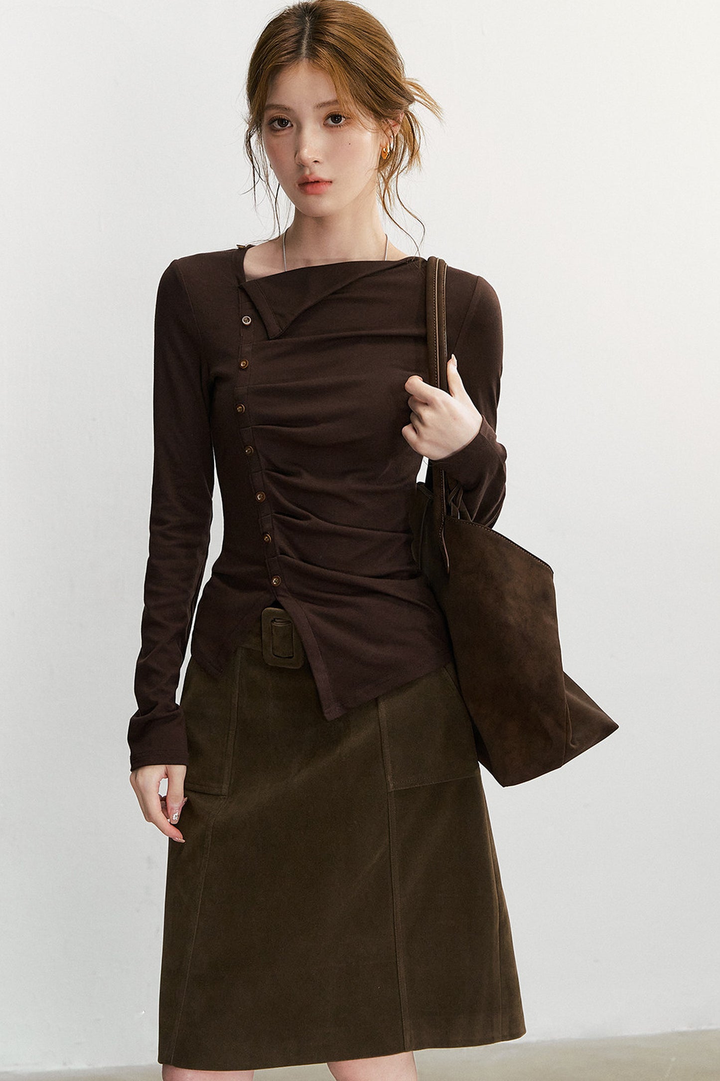 Asymmetrisches langärmeliges Strickoberteil