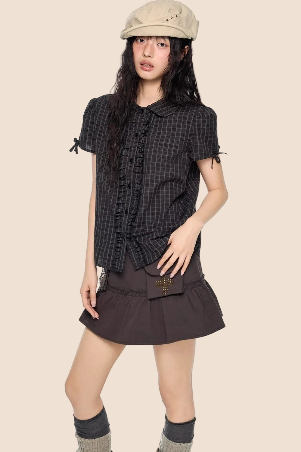 Camicia a righe con fiocco plissettato