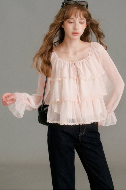 Blouse en mousseline à col carré et volants