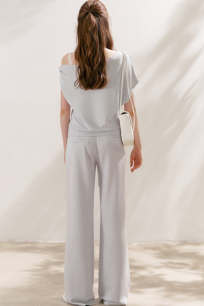 Conjunto de camiseta asimétrica y pantalones de capa de aire
