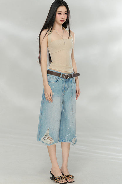 Blusa tubo brillante con cuello halter