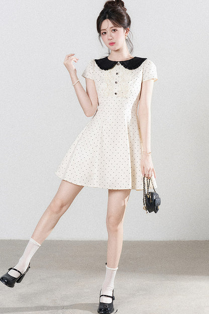 Robe trapèze à pois avec col Claudine