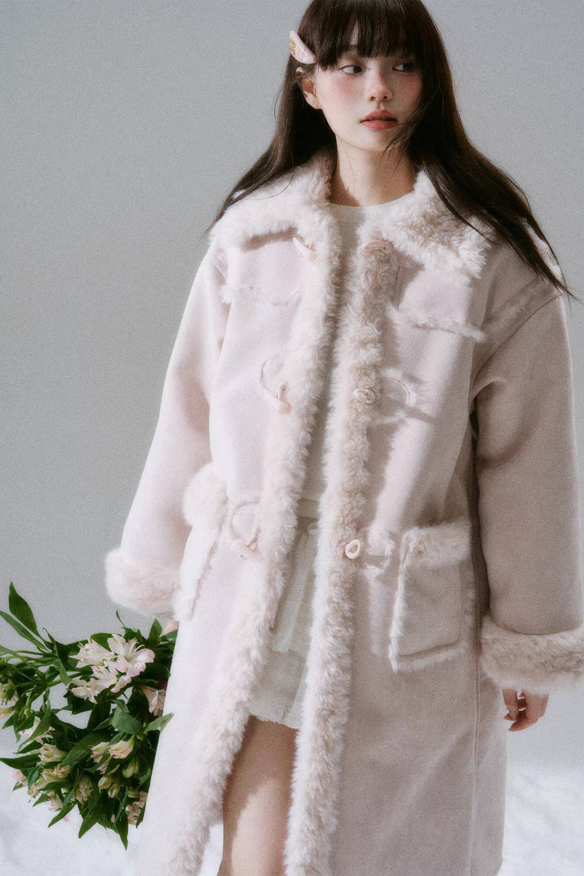 Manteau long à boutons en corne
