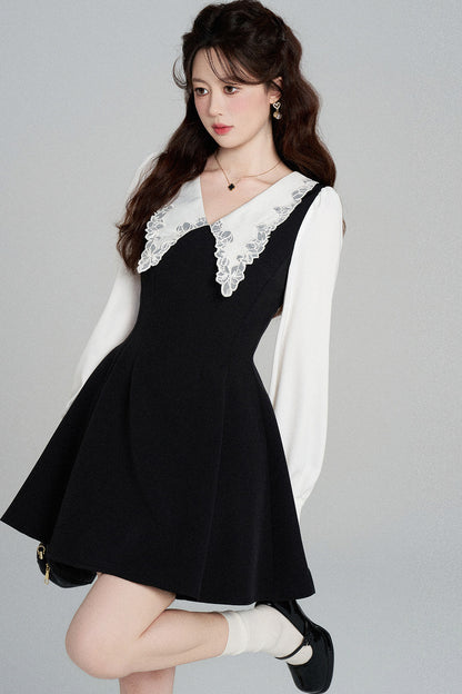 Schwarzes A-Linien-Kleid mit Bubikragen und tailliertem Schnitt