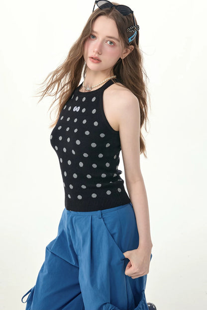 Top all’americana in maglia nero a pois
