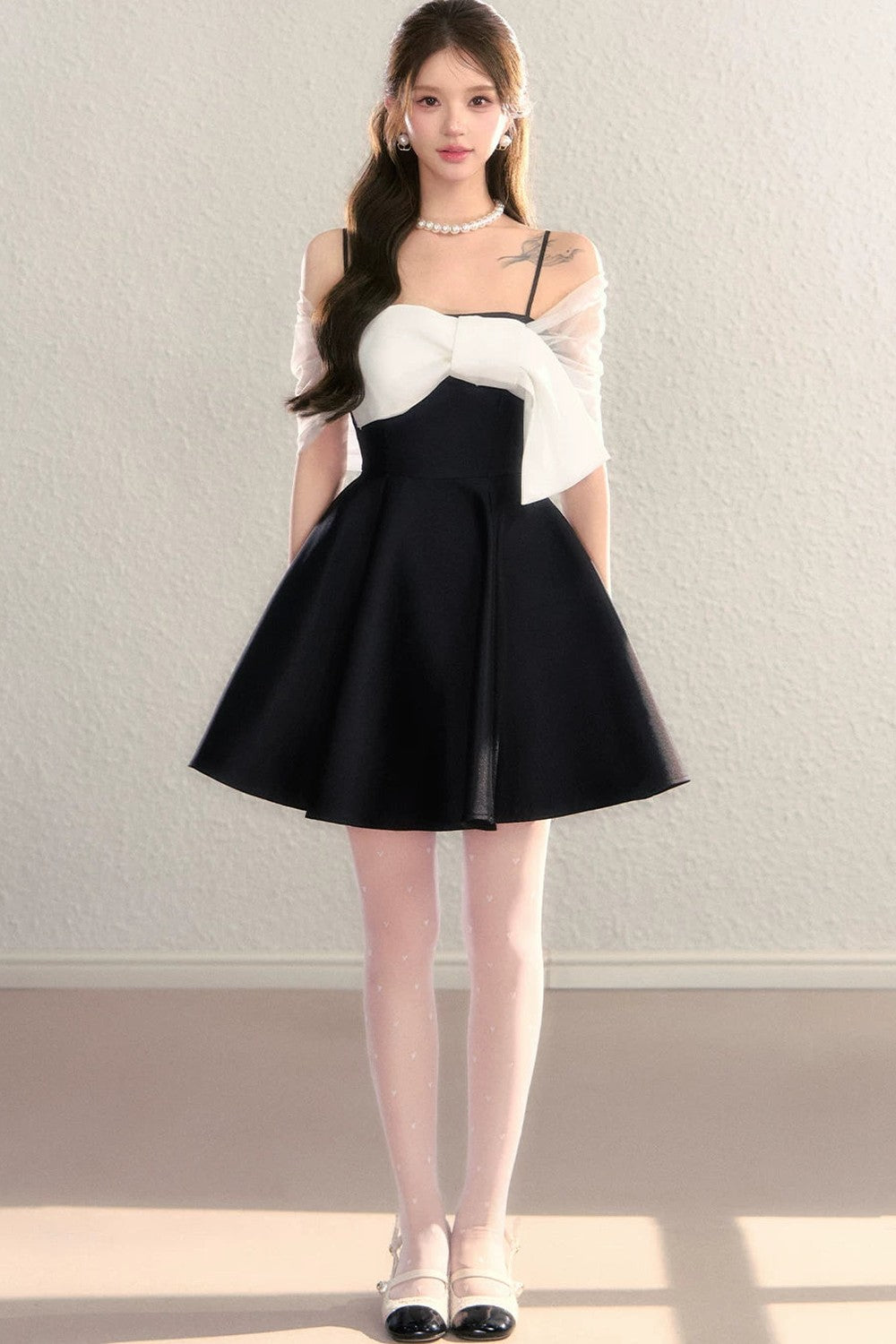 Abito da sera in tulle con spalle scoperte
