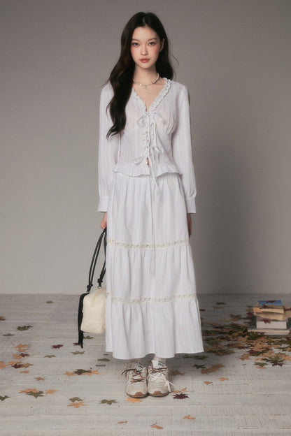 Camicia a maniche lunghe con scollo a V in pizzo e laccetto