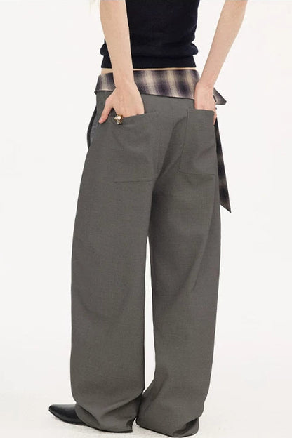 Pantalon à carreaux avec ceinture à nouer