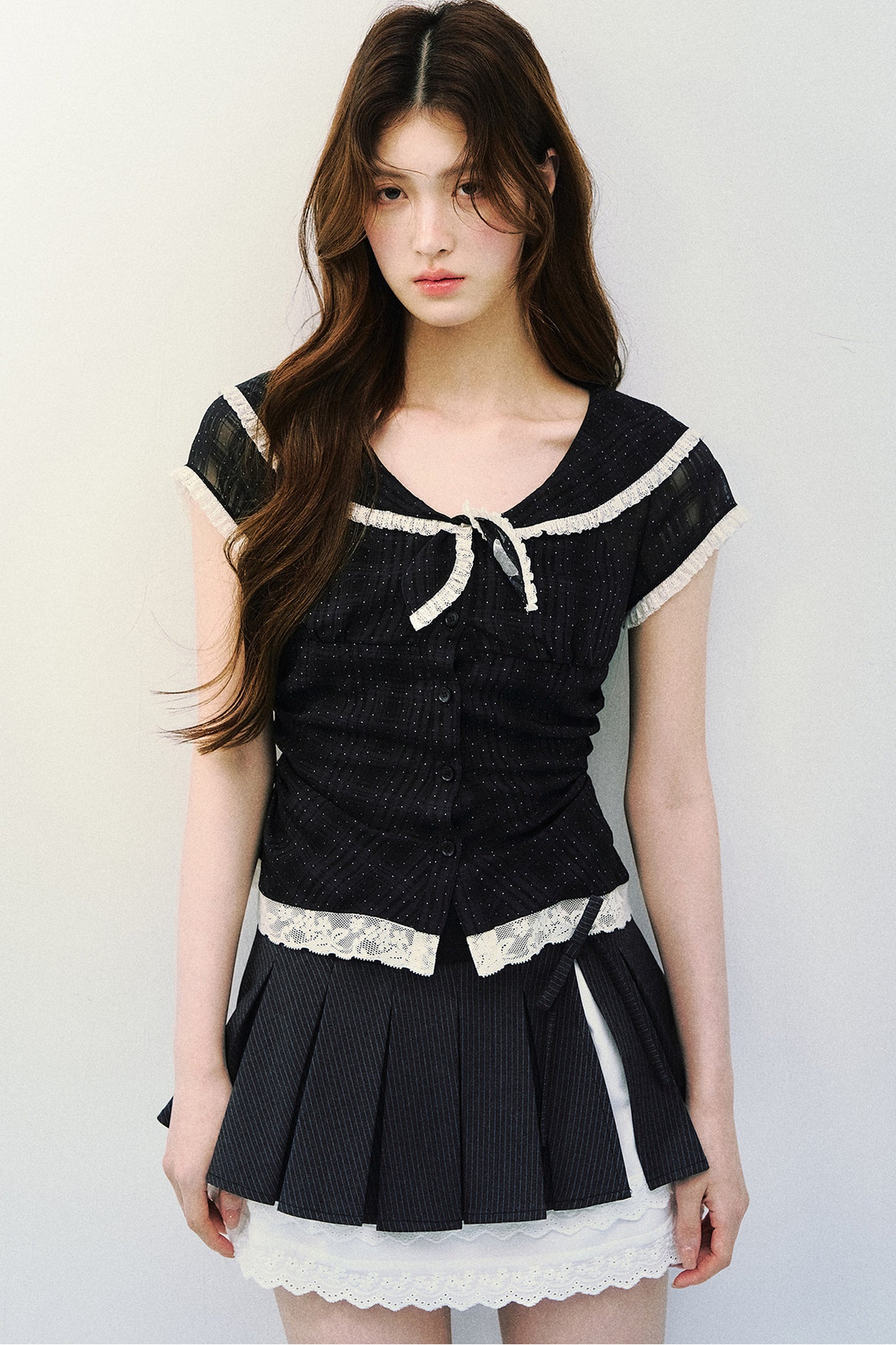 Blusa retrò blu navy a pois