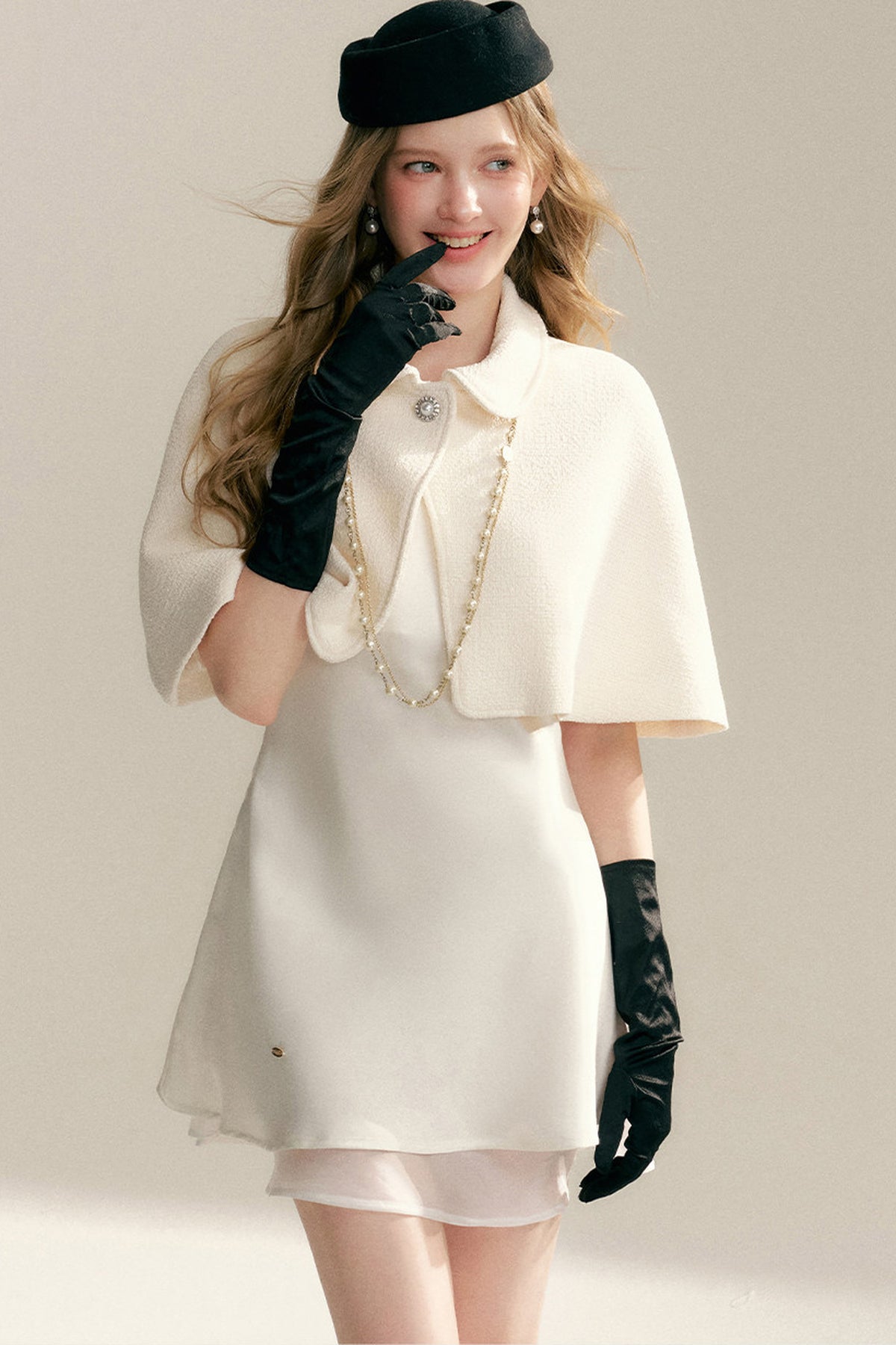 Off-White Sleeveless Cape