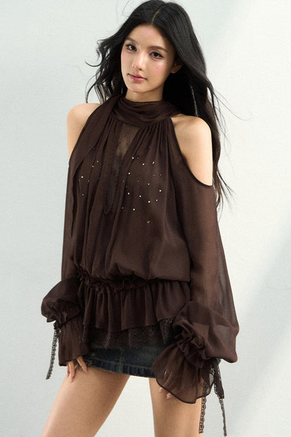 Blusa in tessuto velato e rete con strass