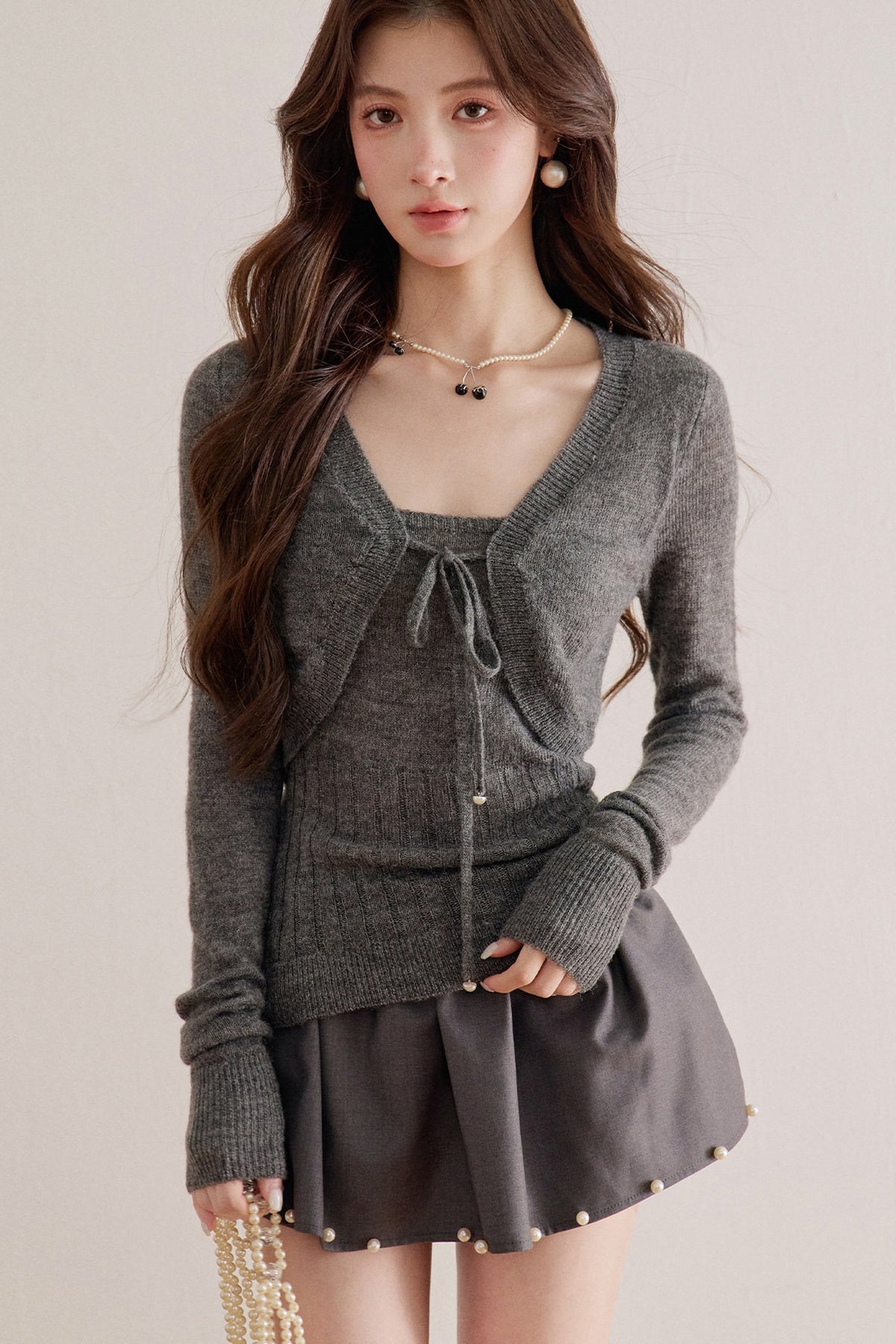 Long-Sleeve V-Neck Lace-Up Knit Sweater