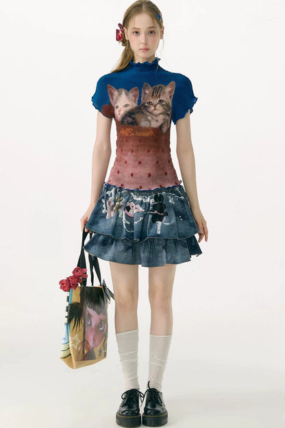 Blusa a blocchi di colore con stampa di gatti