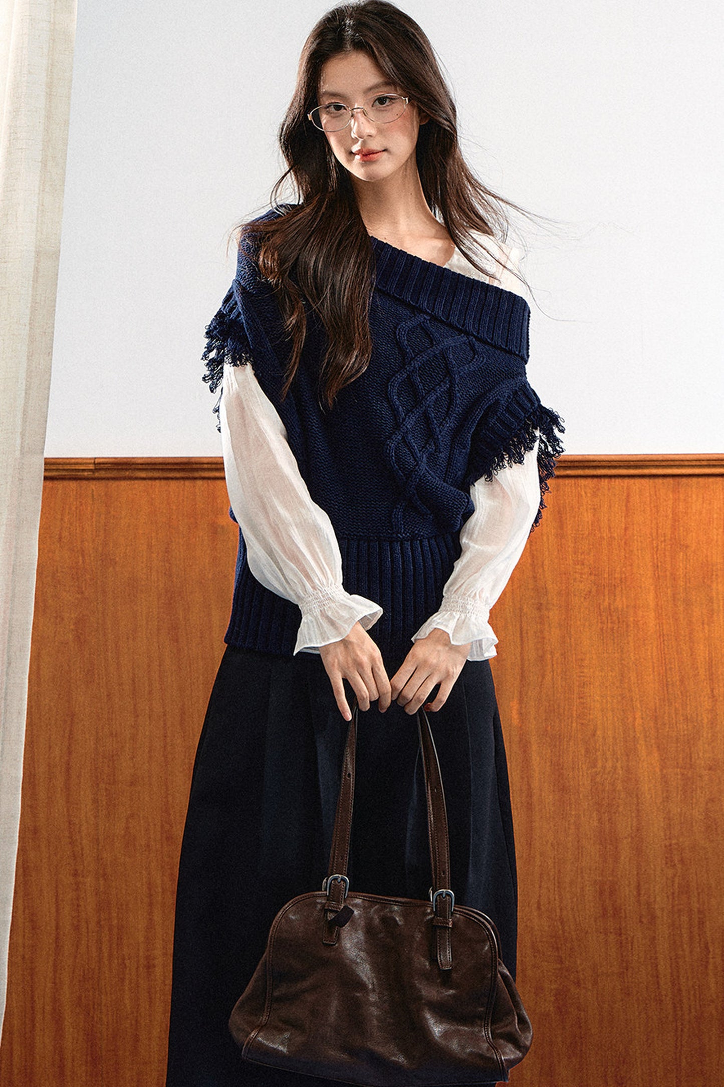 Gilet in maglia con spalla obliqua
