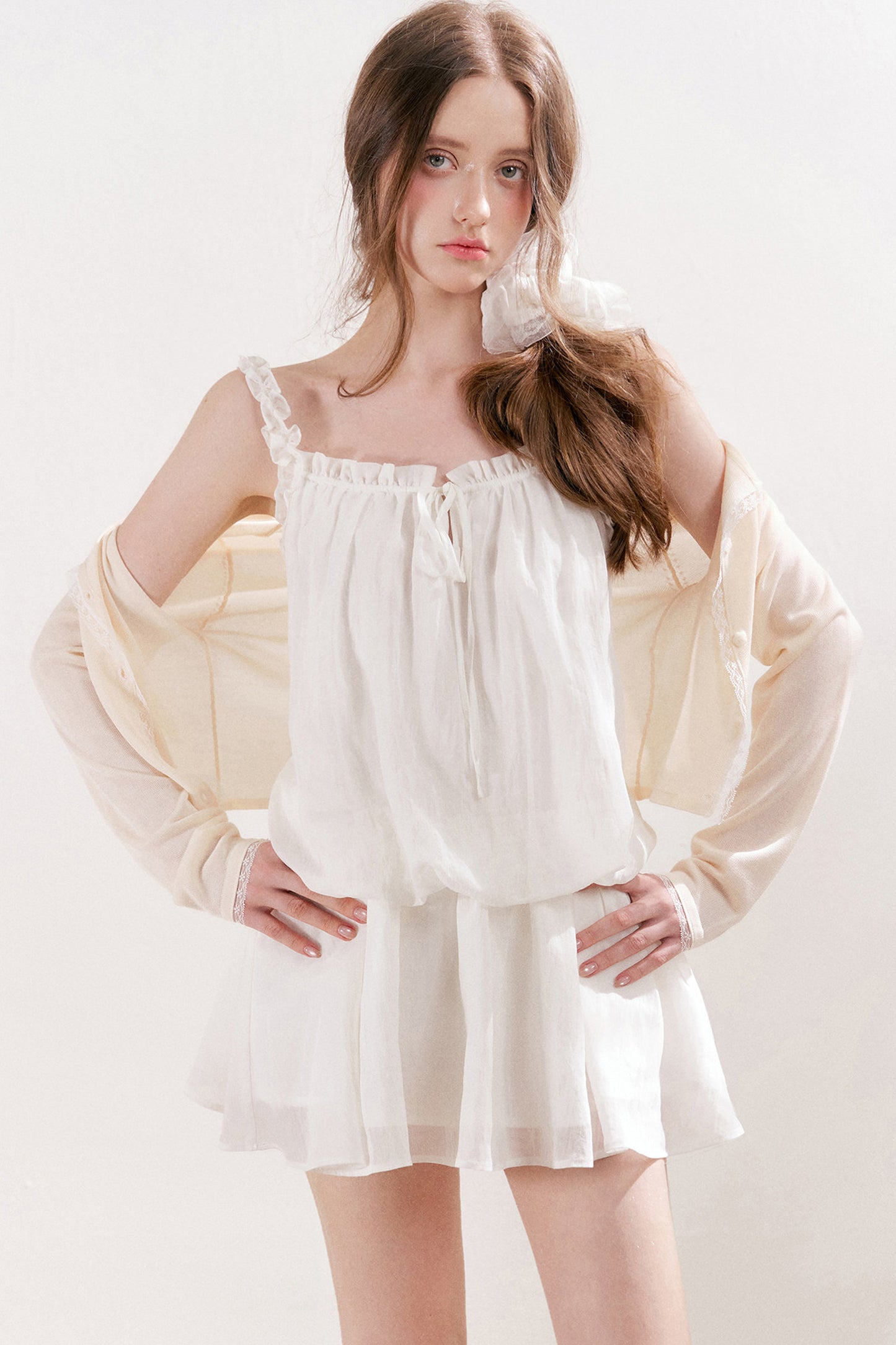 Cardigan in maglia trasparente 100% Lyocell con bordo in pizzo