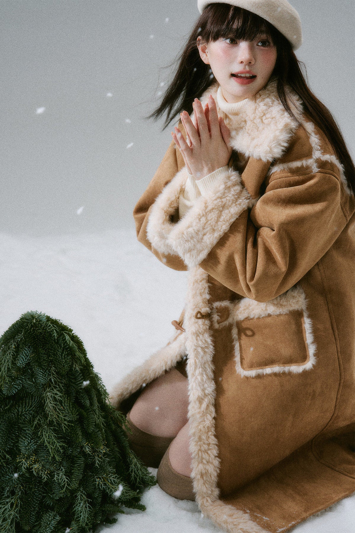 Manteau long à boutons en corne