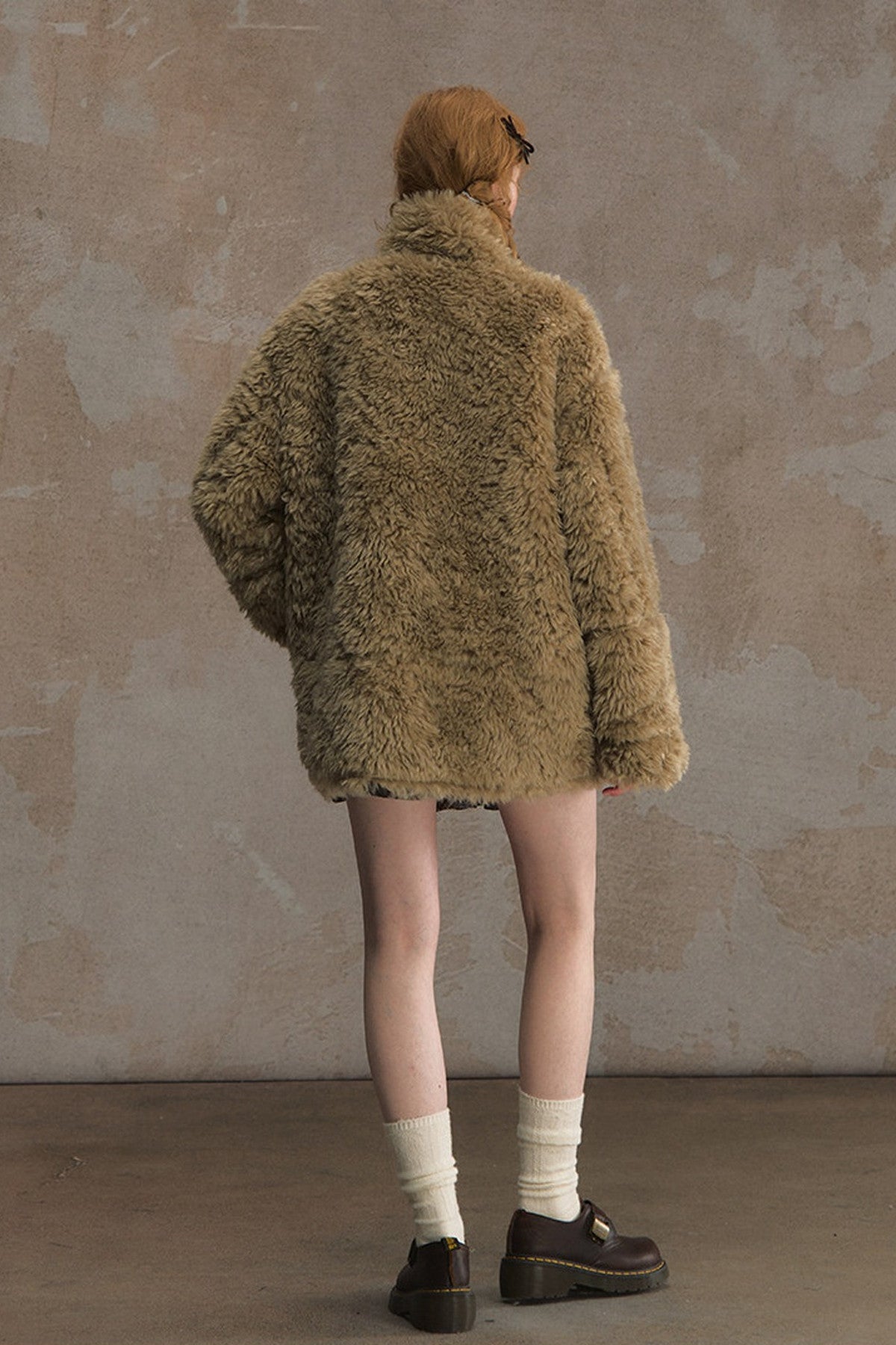 Wendbare flauschige Lammwolljacke