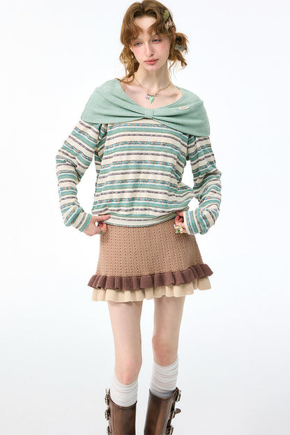 Maglietta in maglia a righe con fiocco verde