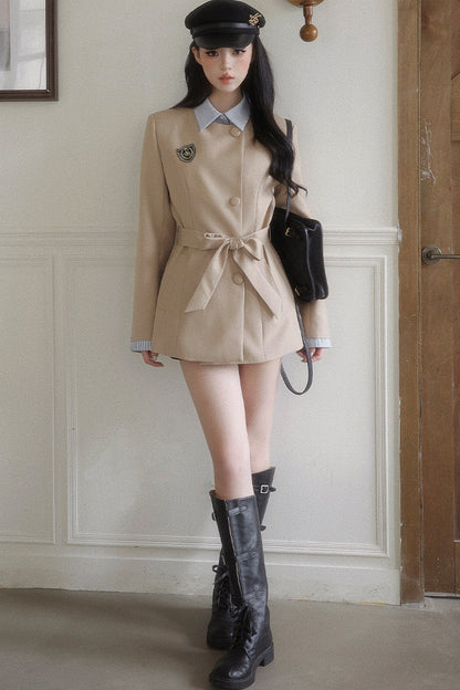 Blazer à nœud cintrant la taille