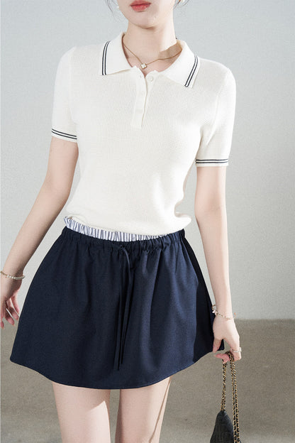 Ensemble tee-shirt polo en tricot blanc à manches courtes et jupe