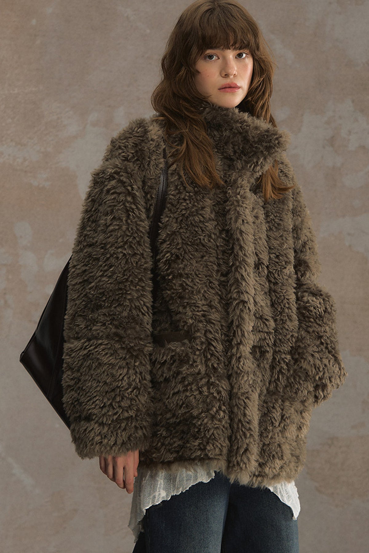 Wendbare flauschige Lammwolljacke