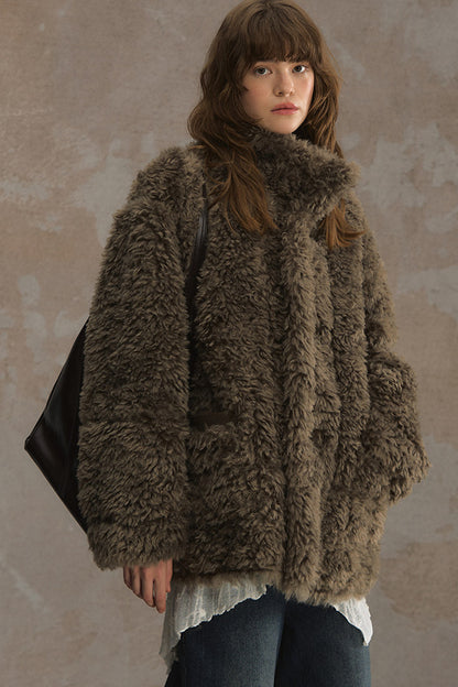 Wendbare flauschige Lammwolljacke