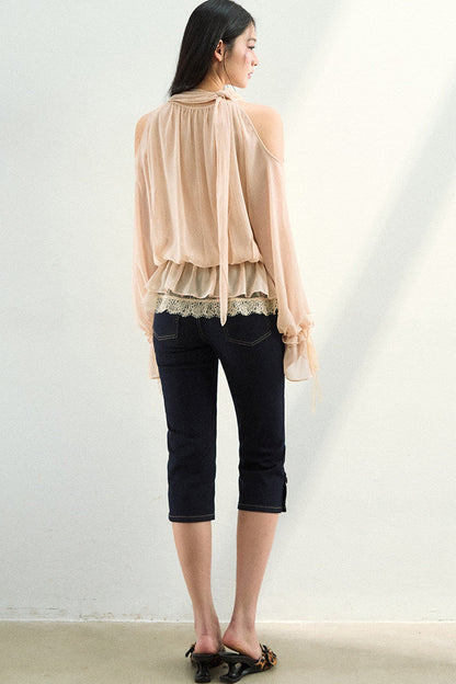 Blusa in tessuto velato e rete con strass